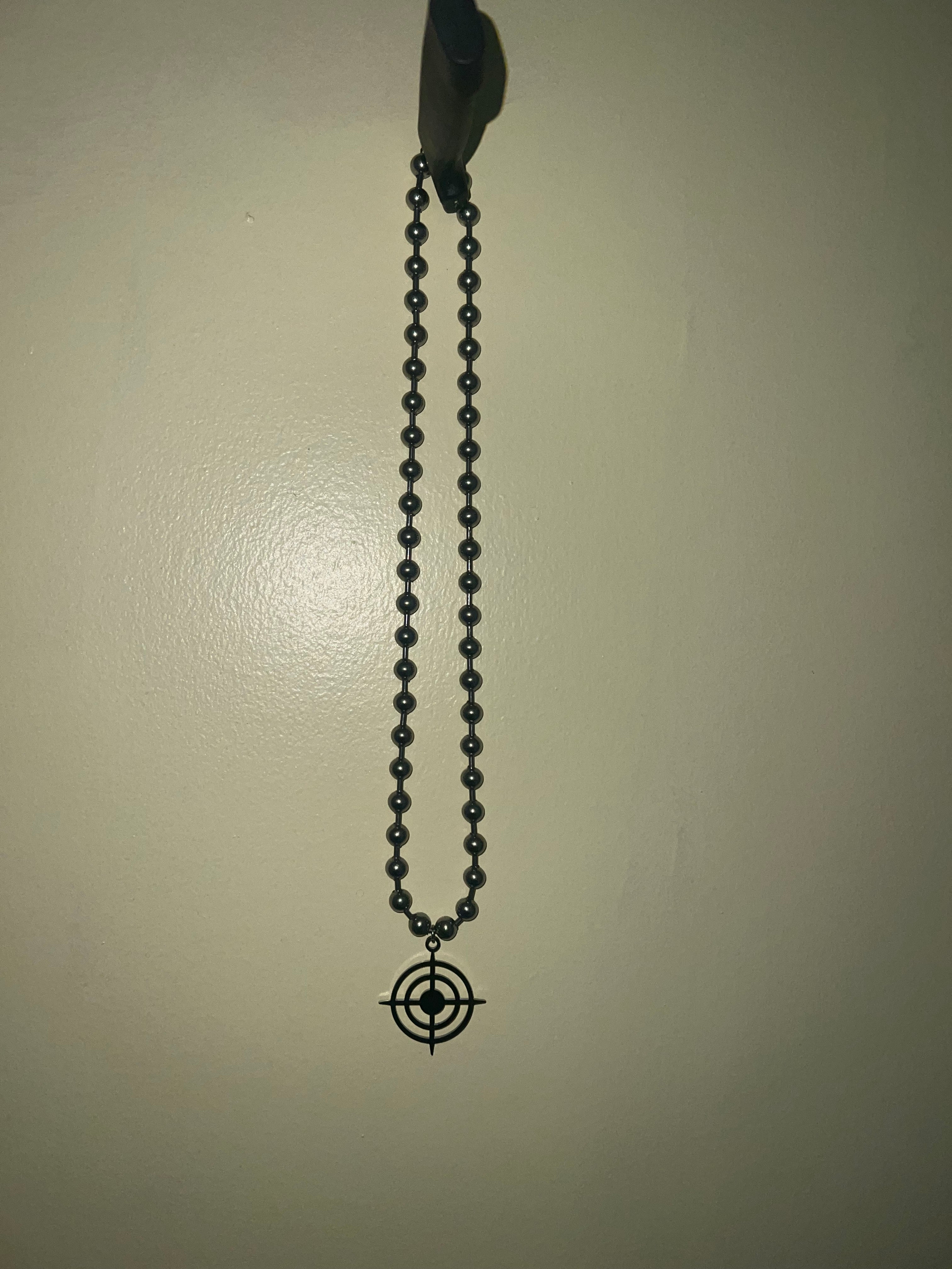 “TARGETED” NECKLACE